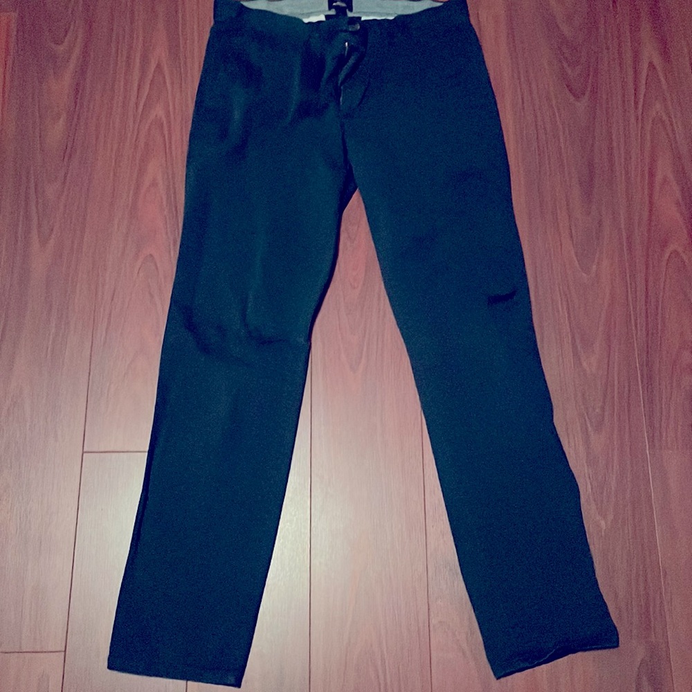 Navy blue khaki pants that I loved but grew out of.